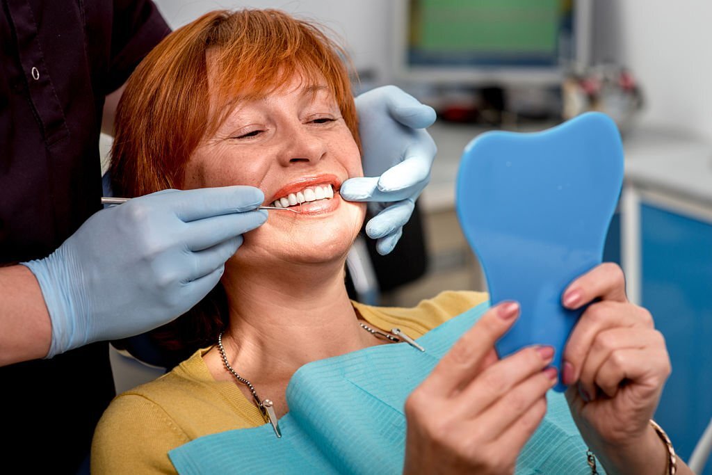 What are cosmetic dentures